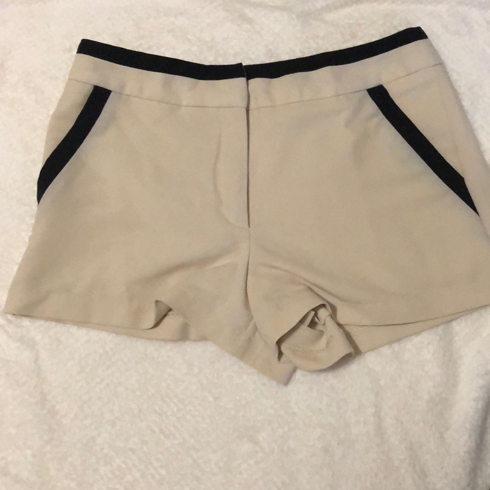 Cream and black shorts